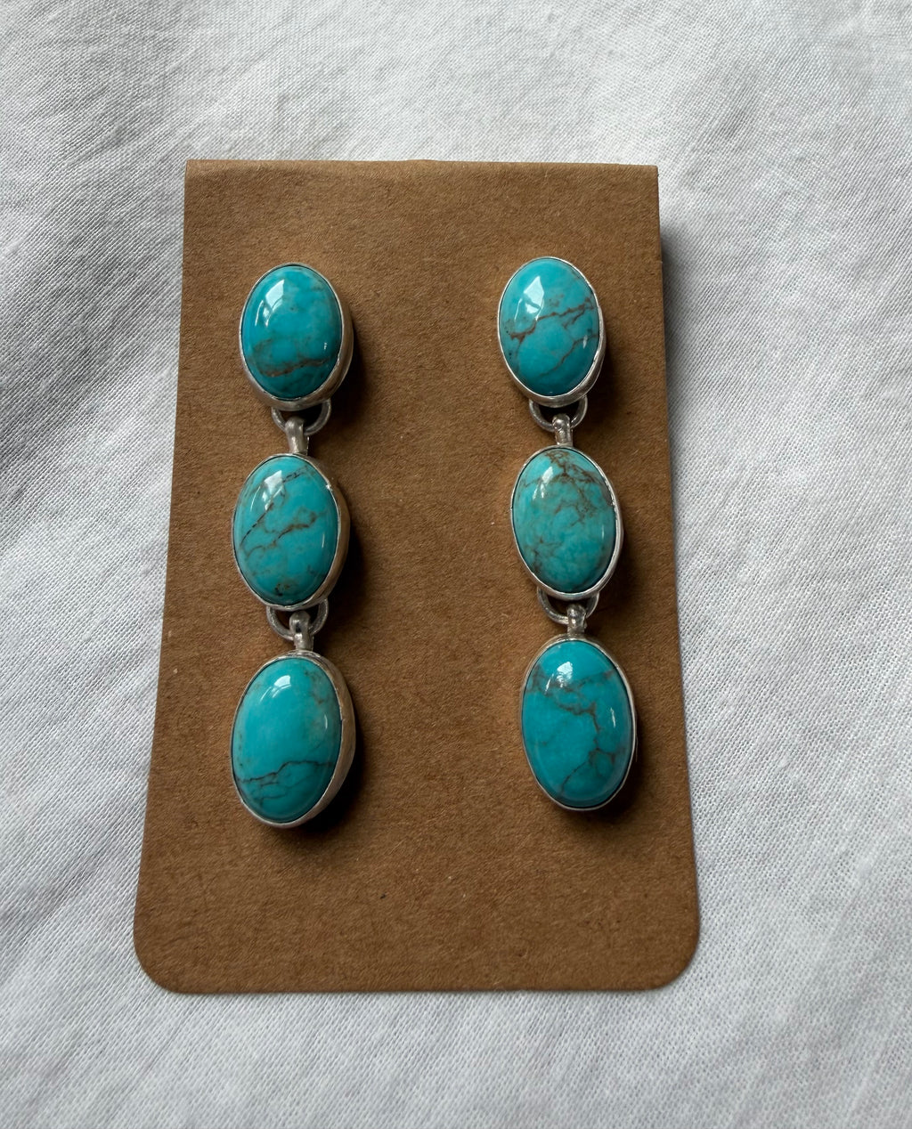 Three stone Kingman dangle earrings